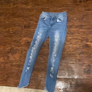 Ripped light blue jeans